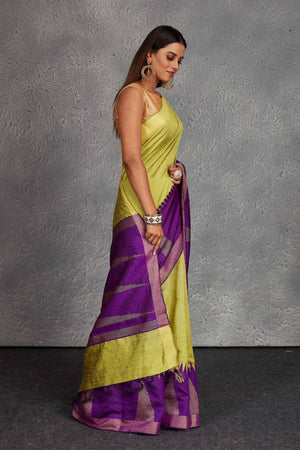 Buy pista green tussar silk saree online in USA with purple temple border. Get festive ready in beautiful Kanchipuram silk saris, pure silk sarees, soft silk sarees, tussar silk saris, handwoven sarees, chanderi silk sarees from Pure Elegance Indian fashion store in USA.-side