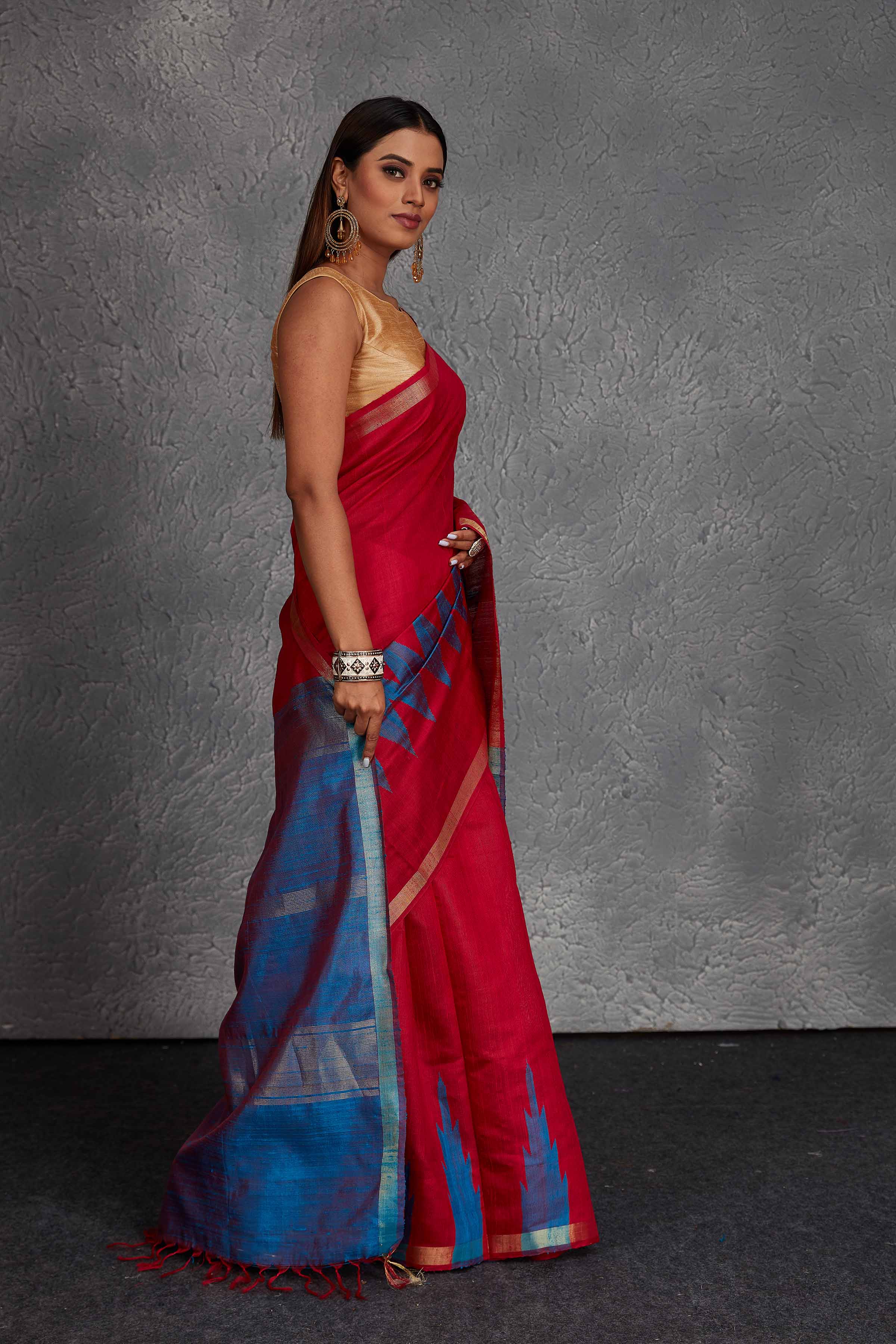 Buy stunning red tussar silk saree online in USA with blue zari pallu. Get festive ready in beautiful Kanchipuram silk saris, pure silk sarees, soft silk sarees, tussar silk saris, handwoven sarees, chanderi silk sarees from Pure Elegance Indian fashion store in USA.-side