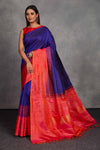Shop beautiful royal blue Kanchirpuram silk sari online in USA with pinkish orange border. Get festive ready in beautiful Kanchipuram silk saris, pure silk sarees, soft silk sarees, tussar silk saris, handwoven sarees, chanderi silk sarees from Pure Elegance Indian fashion store in USA.-full view