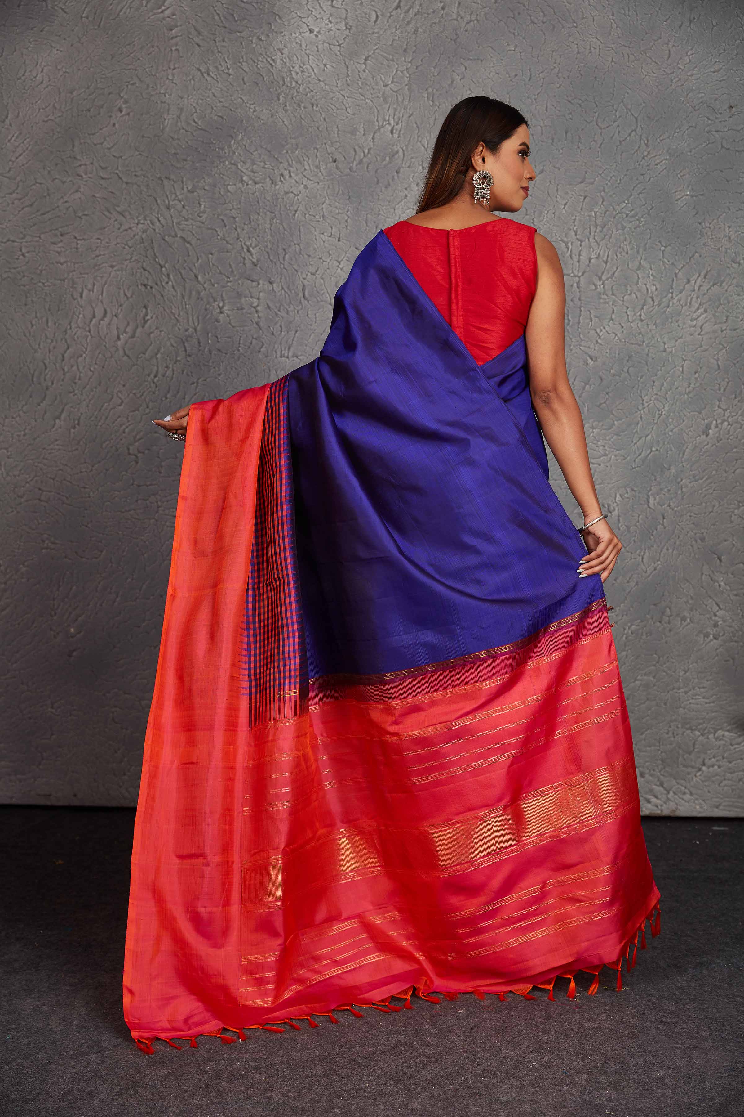 Shop beautiful royal blue Kanchirpuram silk sari online in USA with pinkish orange border. Get festive ready in beautiful Kanchipuram silk saris, pure silk sarees, soft silk sarees, tussar silk saris, handwoven sarees, chanderi silk sarees from Pure Elegance Indian fashion store in USA.-back