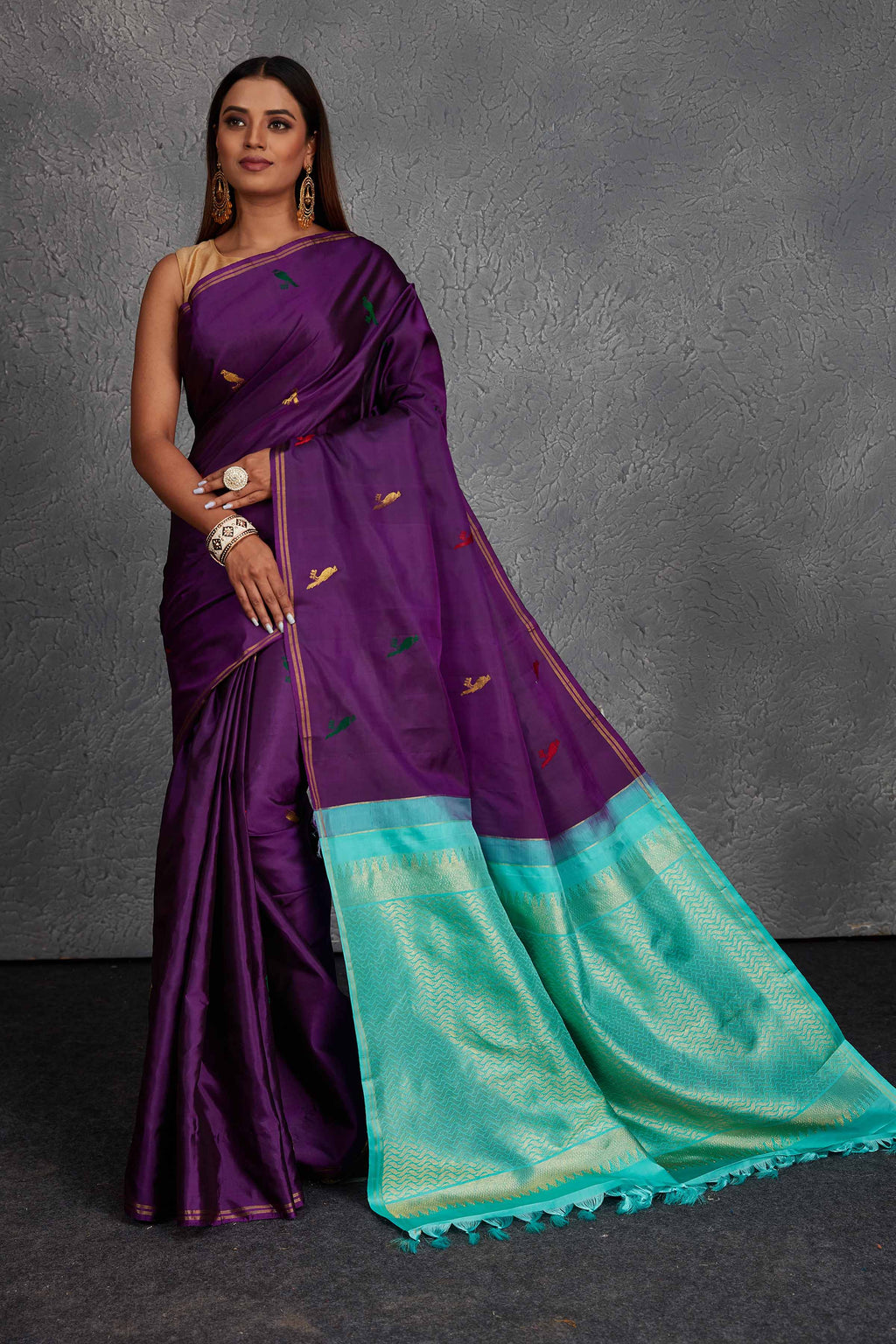 Buy beautiful purple borderless Kanchirpuram silk sari online in USA with sea green pallu. Get festive ready in beautiful Kanchipuram silk saris, pure silk sarees, soft silk sarees, tussar silk saris, handwoven sarees, chanderi silk sarees from Pure Elegance Indian fashion store in USA.-full view