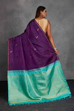 Buy beautiful purple borderless Kanchirpuram silk sari online in USA with sea green pallu. Get festive ready in beautiful Kanchipuram silk saris, pure silk sarees, soft silk sarees, tussar silk saris, handwoven sarees, chanderi silk sarees from Pure Elegance Indian fashion store in USA.-back