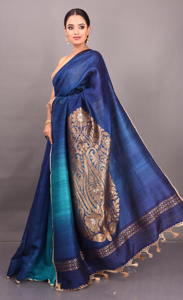 Shop beautiful blue tussar Banarasi saree online in USA with zari motif on pallu. Be the talk of parties and weddings with exquisite designer sarees, embroidered sarees, pure silk saris, Banarasi sarees from Pure Elegance Indian clothing store in USA.Shop online now.-full view