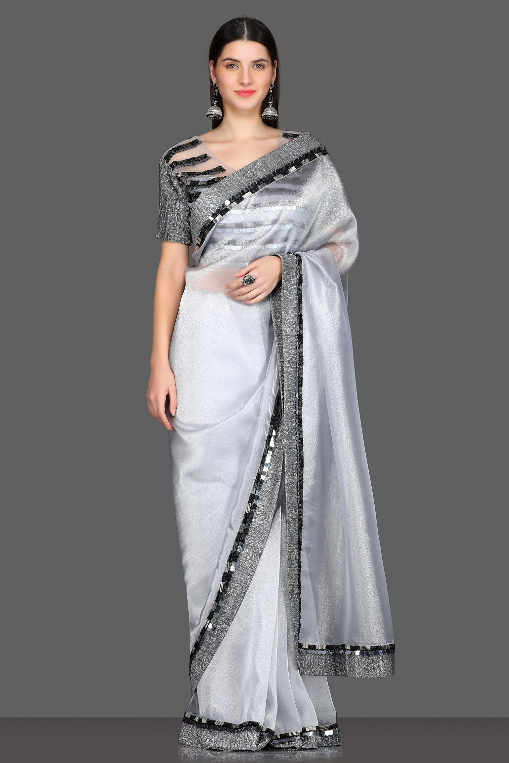 Shop light grey embellished designer saree online in USA with saree blouse. Make a fashion statement at weddings with stunning designer sarees, embroidered sarees with blouse, wedding sarees, handloom sarees from Pure Elegance Indian fashion store in USA.-full view