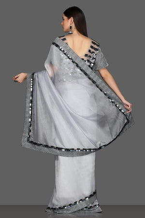 Shop light grey embellished designer saree online in USA with saree blouse. Make a fashion statement at weddings with stunning designer sarees, embroidered sarees with blouse, wedding sarees, handloom sarees from Pure Elegance Indian fashion store in USA.-back