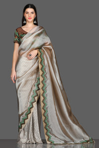 Shop beautiful golden embroidered border organza saree online in USA with embroidered saree blouse. Make a fashion statement at weddings with stunning designer sarees, embroidered sarees with blouse, wedding sarees, handloom sarees from Pure Elegance Indian fashion store in USA.-full view