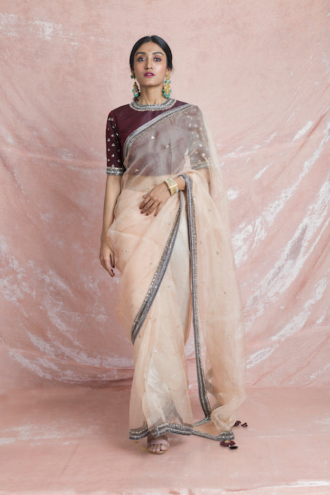 Buy beautiful beige embroidered organza saree online in USA with wine color embroidered saree blouse. Champion ethnic fashion on weddings and festivals with a stunning collection of designer sarees, handloom saris with blouse, wedding sarees, from Pure Elegance Indian fashion store in USA.-full view