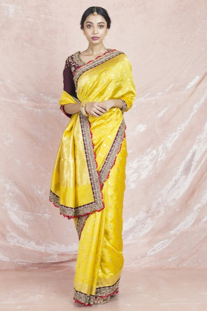 Shop stunning yellow embroidered handloom sari online in USA with brown embroidered saree blouse. Champion ethnic fashion on weddings and festivals with a stunning collection of designer sarees, handloom sarees with blouse, wedding sarees, from Pure Elegance Indian fashion store in USA.-full view