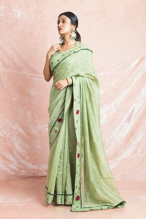 Shop elegant pista green embroidered Banarasi chanderi saree online in USA with sari blouse. Champion ethnic fashion on weddings and festivals with a stunning collection of Banarasi sarees, handloom sarees with blouse, bridal sarees, from Pure Elegance Indian fashion store in USA.-side