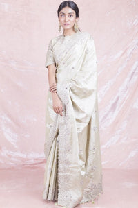 Buy beautiful cream embroidered handloom saree online in USA with matching embroidered sari blouse. Champion ethnic fashion on weddings and festivals with a stunning collection of designer sarees, handloom saris with blouse, wedding sarees, from Pure Elegance Indian fashion store in USA.-full view