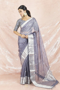 Shop gorgeous grey mirror work handloom saree online in USA with embroidered sari blouse. Champion ethnic fashion on weddings and festivals with a stunning collection of Banarasi sarees, handloom sarees with blouse, bridal sarees, from Pure Elegance Indian fashion store in USA.-full view