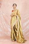 Shop gorgeous golden handloom saree online in USA with red bandhej saree blouse. Champion ethnic fashion on weddings and festivals with a stunning collection of Banarasi sarees, handloom sarees with blouse, bridal sarees, from Pure Elegance Indian fashion store in USA.-full view