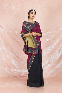 Shop elegant wine and black handloom sari online in USA with black printed saree blouse. Champion ethnic fashion on weddings and festivals with a stunning collection of Banarasi sarees, handloom sarees with blouse, bridal sarees, from Pure Elegance Indian fashion store in USA.-full view