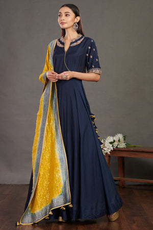 Buy gorgeous blue embroidered Anarkali gown online in USA with yellow dupatta. Make a fashion statement on festive occasions and weddings with designer suits, Indian dresses, Anarkali suits, palazzo suits, designer gowns, sharara suits from Pure Elegance Indian fashion store in USA.-side