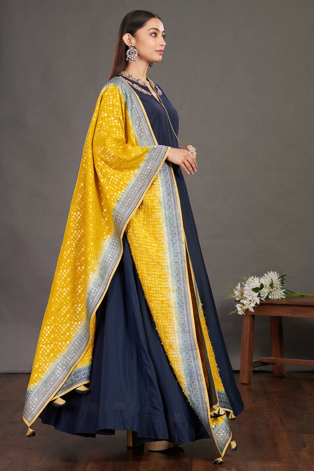 Buy gorgeous blue embroidered Anarkali gown online in USA with yellow dupatta. Make a fashion statement on festive occasions and weddings with designer suits, Indian dresses, Anarkali suits, palazzo suits, designer gowns, sharara suits from Pure Elegance Indian fashion store in USA.-right