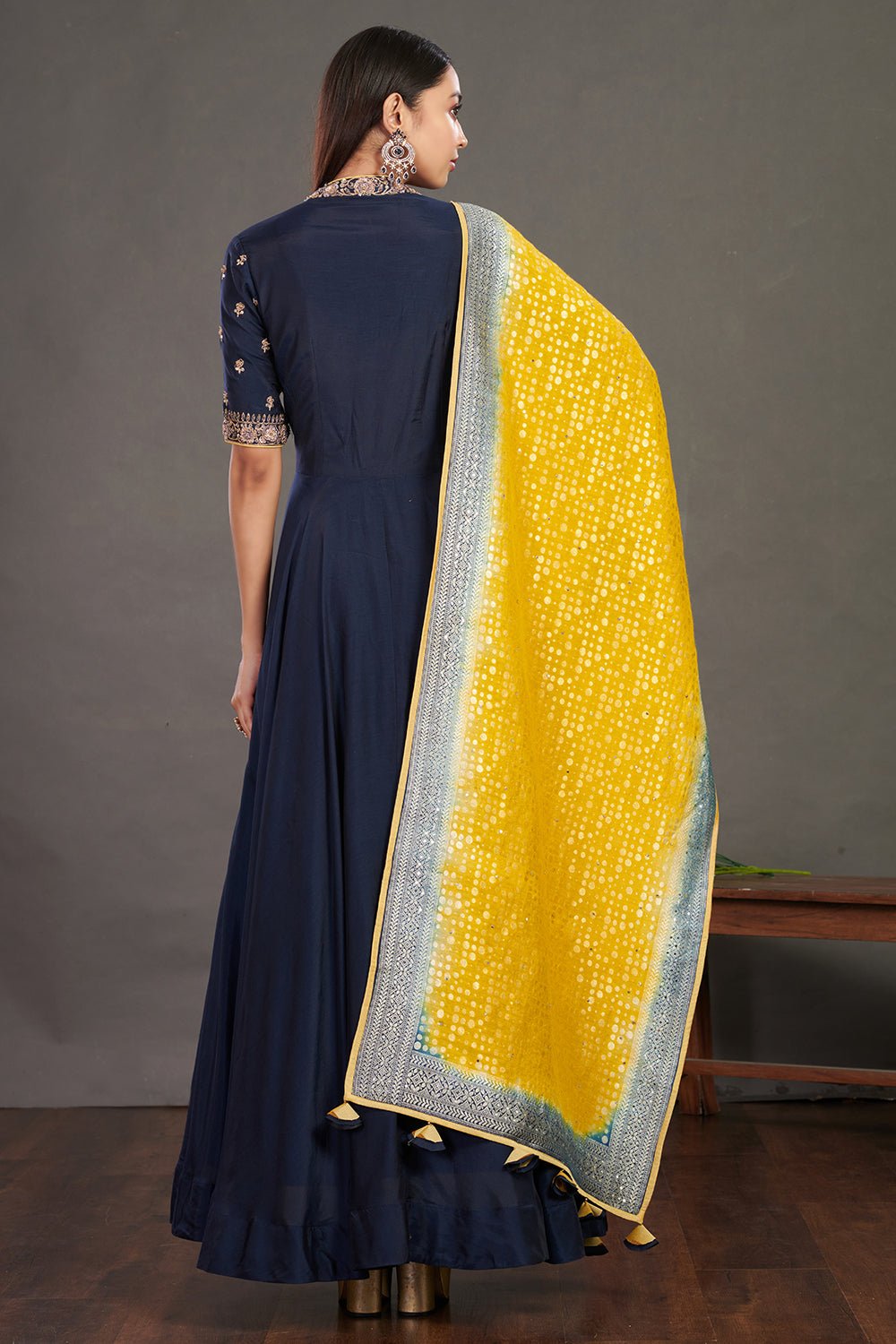 Buy gorgeous blue embroidered Anarkali gown online in USA with yellow dupatta. Make a fashion statement on festive occasions and weddings with designer suits, Indian dresses, Anarkali suits, palazzo suits, designer gowns, sharara suits from Pure Elegance Indian fashion store in USA.- back