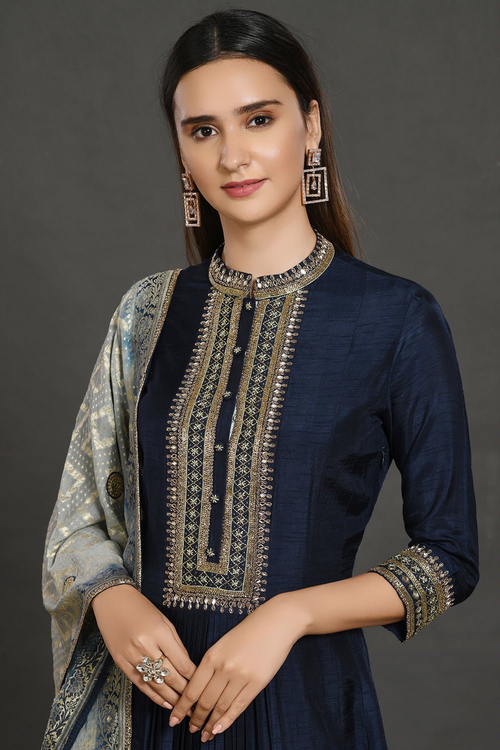 Shop beautiful blue embroidered Anarkali gown online in USA with grey dupatta. Make a fashion statement on festive occasions and weddings with designer suits, Indian dresses, Anarkali suits, palazzo suits, designer gowns, sharara suits from Pure Elegance Indian fashion store in USA.-closeup