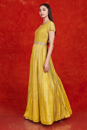 Buy gorgeous yellow fit and flare mirror work gown online in USA. Make a fashion statement on festive occasions and weddings with designer suits, Indian dresses, Anarkali suits, palazzo suits, designer gowns, sharara suits from Pure Elegance Indian fashion store in USA.-side