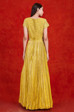 Buy gorgeous yellow fit and flare mirror work gown online in USA. Make a fashion statement on festive occasions and weddings with designer suits, Indian dresses, Anarkali suits, palazzo suits, designer gowns, sharara suits from Pure Elegance Indian fashion store in USA.-back