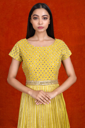 Buy gorgeous yellow fit and flare mirror work gown online in USA. Make a fashion statement on festive occasions and weddings with designer suits, Indian dresses, Anarkali suits, palazzo suits, designer gowns, sharara suits from Pure Elegance Indian fashion store in USA.-closeup