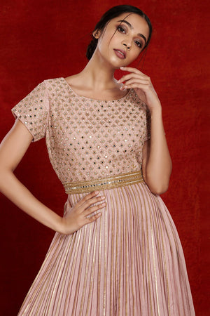 Shop stunning powder pink fit and flare mirror work gown online in USA. Make a fashion statement on festive occasions and weddings with designer suits, Indian dresses, Anarkali suits, palazzo suits, designer gowns, sharara suits from Pure Elegance Indian fashion store in USA.-closeup