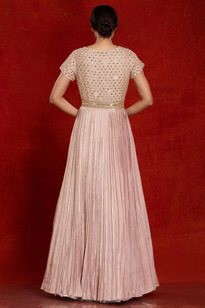 Shop stunning powder pink fit and flare mirror work gown online in USA. Make a fashion statement on festive occasions and weddings with designer suits, Indian dresses, Anarkali suits, palazzo suits, designer gowns, sharara suits from Pure Elegance Indian fashion store in USA.-back
