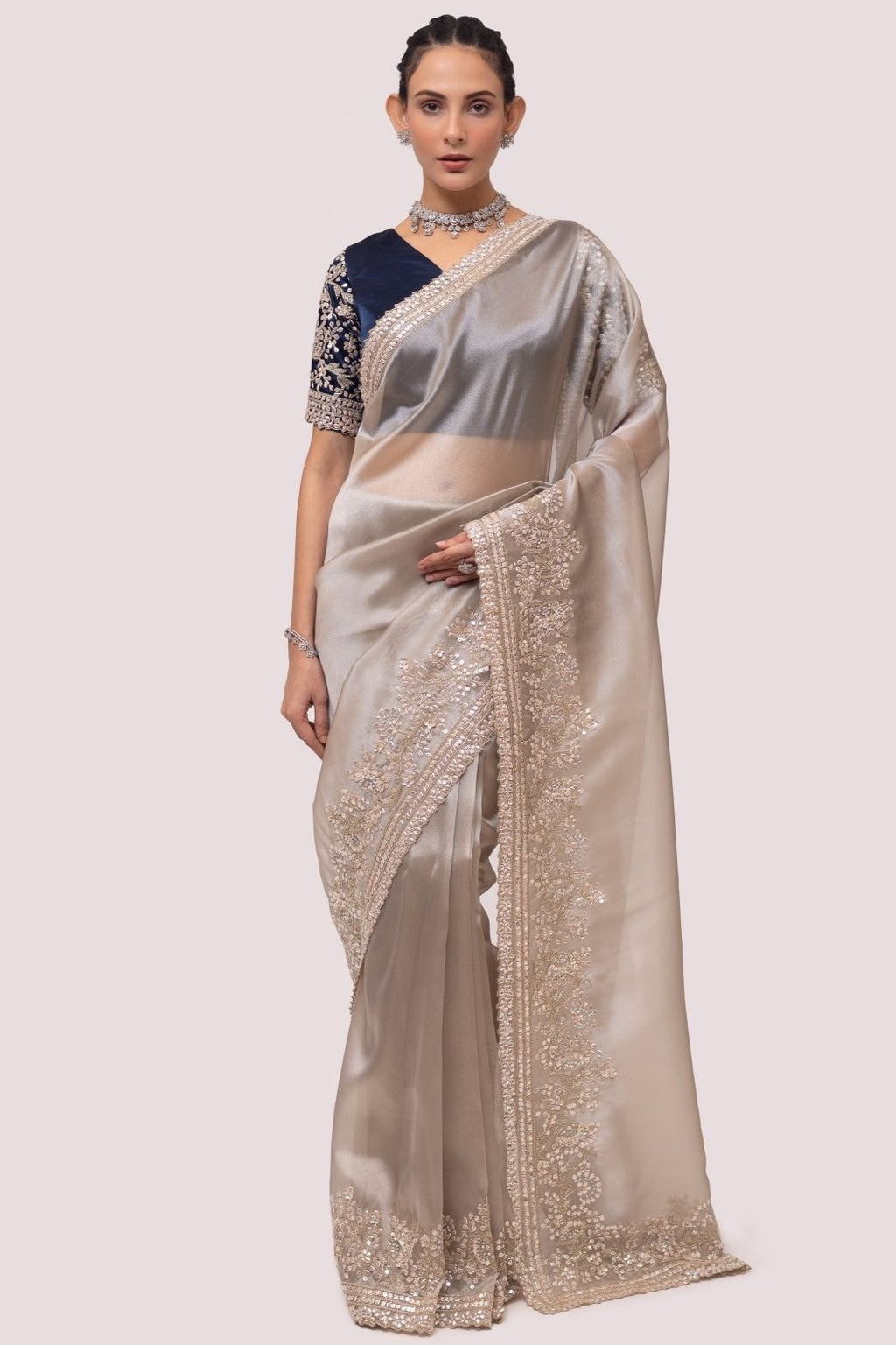 Buy silver embroidered organza saree online in USA with blue blouse. Make a fashion statement on festive occasions and weddings with designer sarees, designer suits, Indian dresses, Anarkali suits, palazzo suits, designer gowns, sharara suits, embroidered sarees from Pure Elegance Indian fashion store in USA.-full view