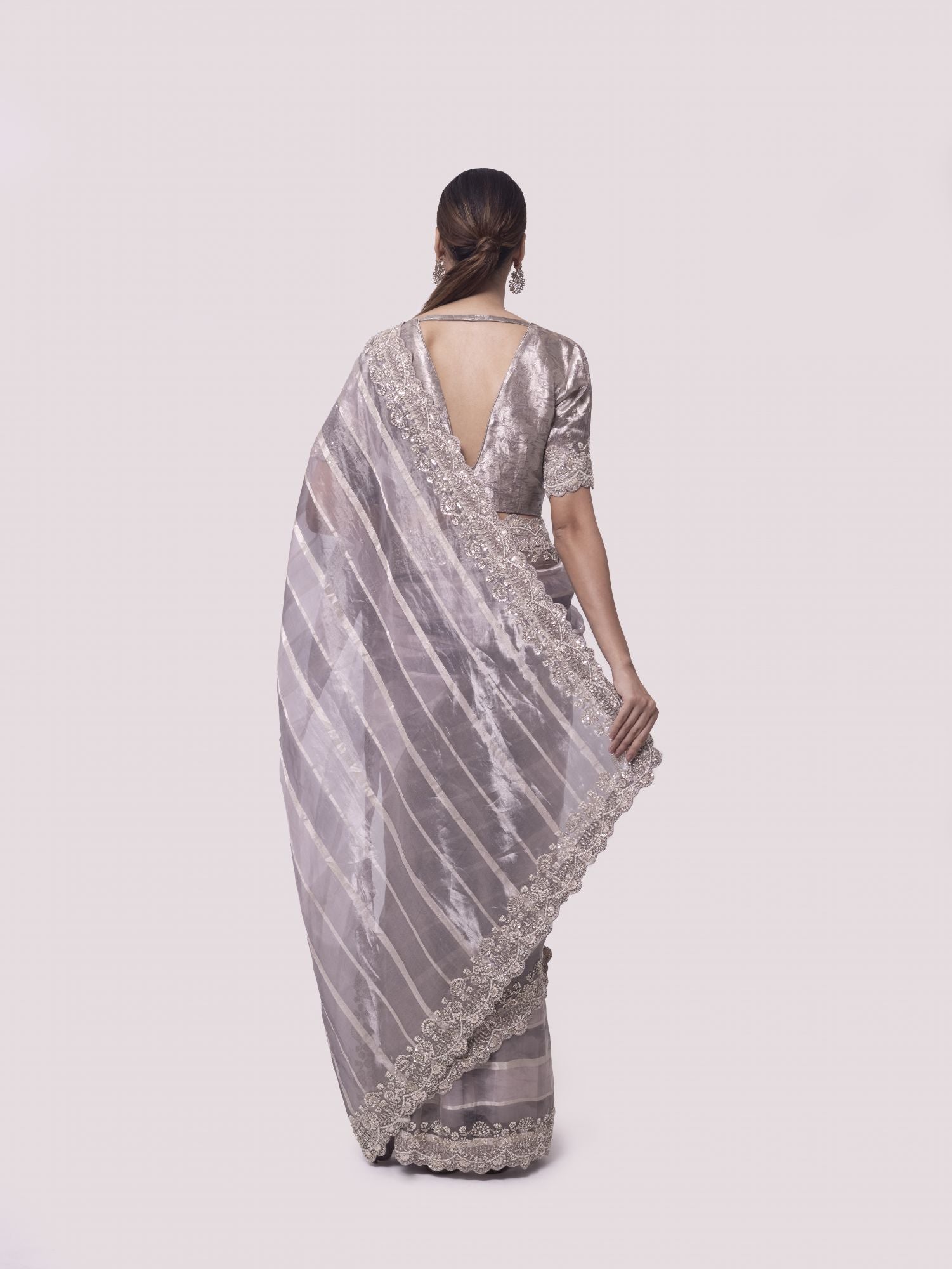Buy beautiful two-tone silver embroidered handloom saree online in USA with blouse. Make a fashion statement on festive occasions and weddings with designer sarees, designer suits, Indian dresses, Anarkali suits, palazzo suits, designer gowns, sharara suits, embroidered sarees from Pure Elegance Indian fashion store in USA.-back