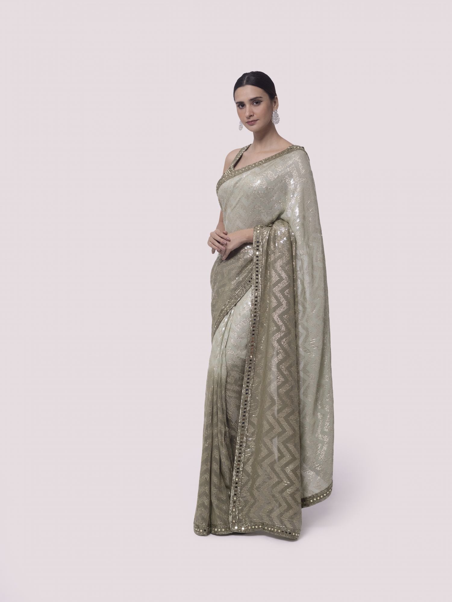 Shop stunning green shaded sequin work georgette saree online in USA with blouse. Make a fashion statement on festive occasions and weddings with designer sarees, designer suits, Indian dresses, Anarkali suits, palazzo suits, designer gowns, sharara suits, embroidered sarees from Pure Elegance Indian fashion store in USA.-side