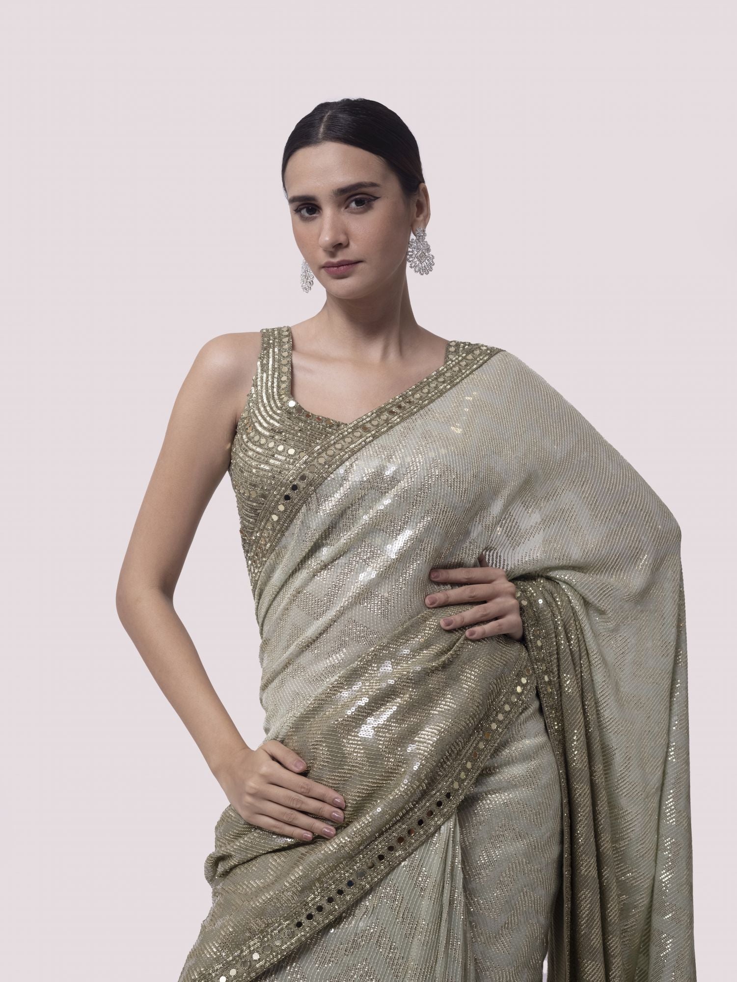 Shop stunning green shaded sequin work georgette saree online in USA with blouse. Make a fashion statement on festive occasions and weddings with designer sarees, designer suits, Indian dresses, Anarkali suits, palazzo suits, designer gowns, sharara suits, embroidered sarees from Pure Elegance Indian fashion store in USA.-closeup