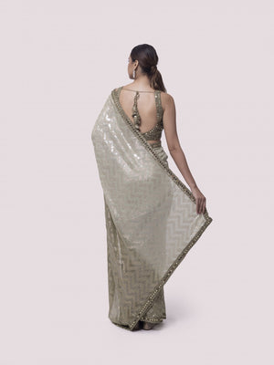 Shop stunning green shaded sequin work georgette saree online in USA with blouse. Make a fashion statement on festive occasions and weddings with designer sarees, designer suits, Indian dresses, Anarkali suits, palazzo suits, designer gowns, sharara suits, embroidered sarees from Pure Elegance Indian fashion store in USA.-back
