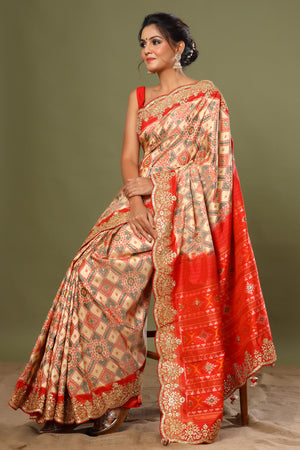 Shop cream Patola silk saree online in USA with scalloped border. Make a fashion statement at weddings with stunning designer sarees, embroidered sarees with blouse, wedding sarees, handloom sarees from Pure Elegance Indian fashion store in USA.-saree