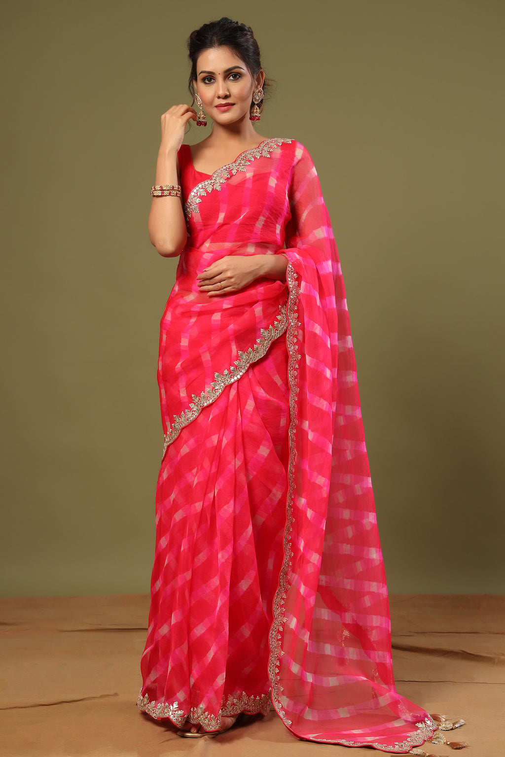 Shop rani pink heavy embroidery organza silk saree online in USA with scalloped border. Make a fashion statement at weddings with stunning designer sarees, embroidered sarees with blouse, wedding sarees, handloom sarees from Pure Elegance Indian fashion store in USA.-full view