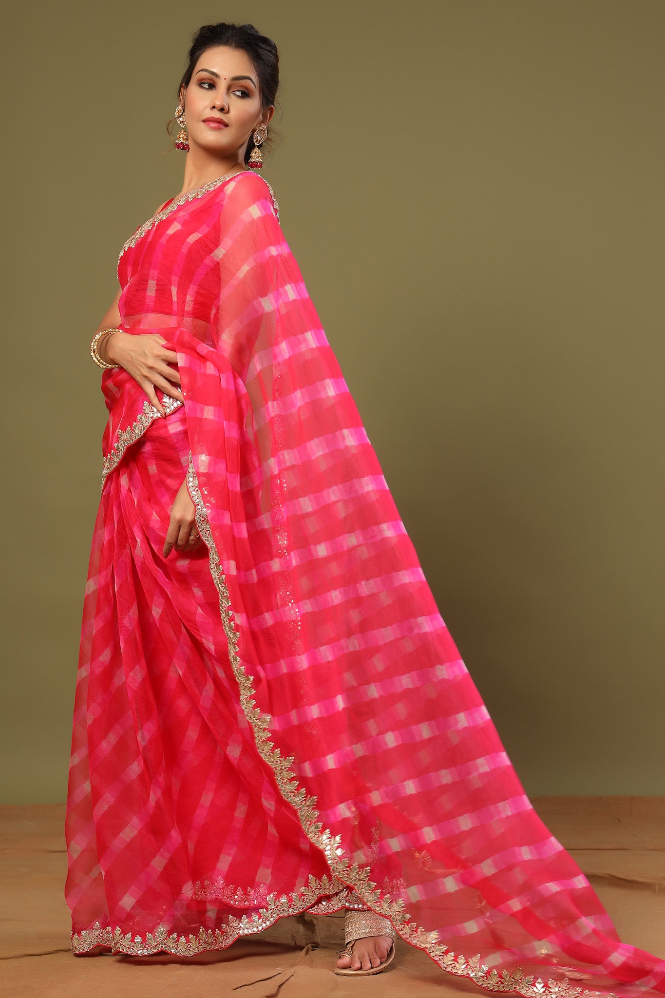 Shop rani pink heavy embroidery organza silk saree online in USA with scalloped border. Make a fashion statement at weddings with stunning designer sarees, embroidered sarees with blouse, wedding sarees, handloom sarees from Pure Elegance Indian fashion store in USA.-side