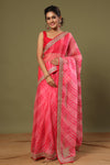 Shop pink striped organza silk saree online in USA with embroidered border. Make a fashion statement at weddings with stunning designer sarees, embroidered sarees with blouse, wedding sarees, handloom sarees from Pure Elegance Indian fashion store in USA.-full view
