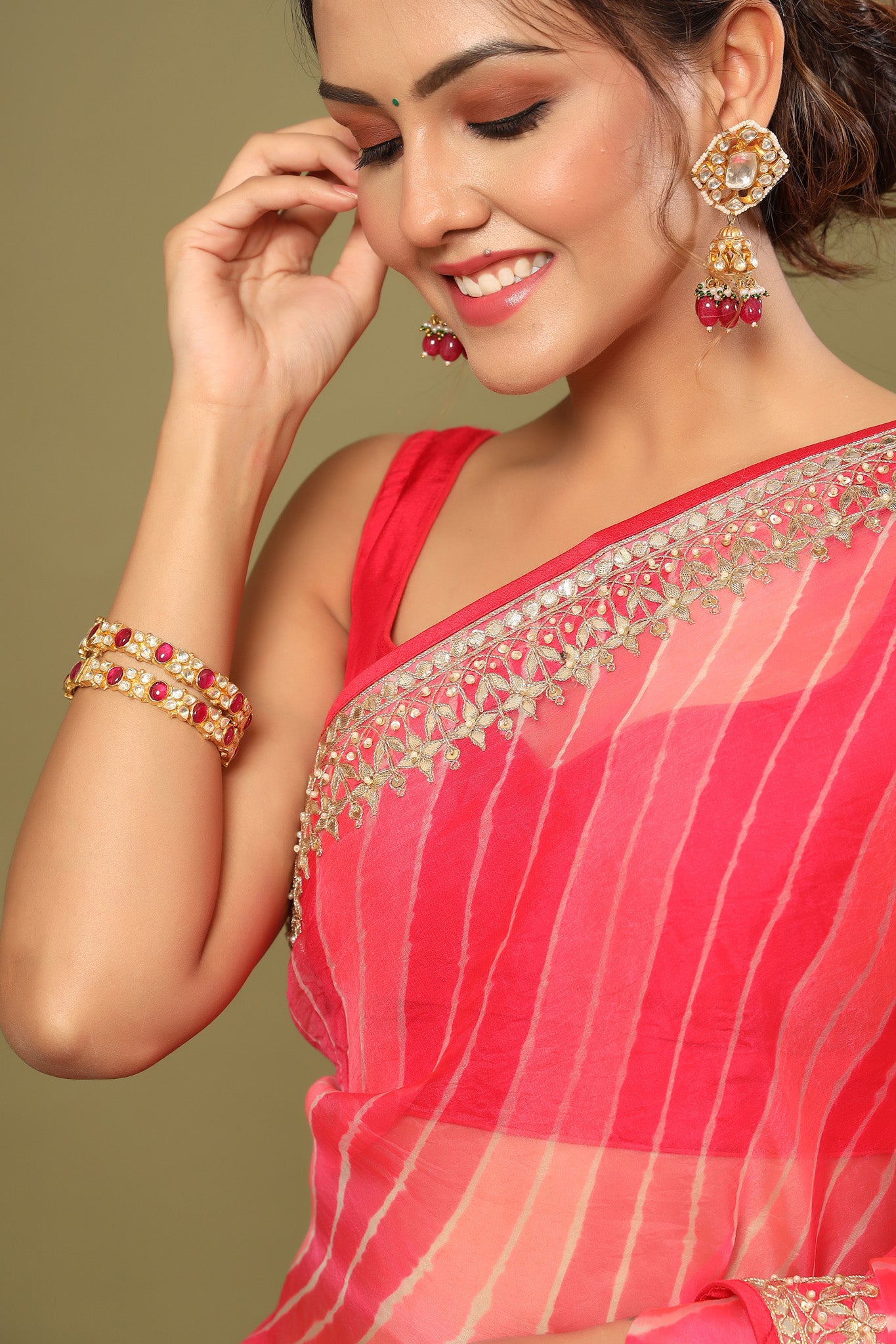 Shop pink striped organza silk saree online in USA with embroidered border. Make a fashion statement at weddings with stunning designer sarees, embroidered sarees with blouse, wedding sarees, handloom sarees from Pure Elegance Indian fashion store in USA.-closeup