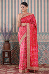 Buy pink Patola silk sari online in USA with embroidered border. Make a fashion statement at weddings with stunning designer sarees, embroidered sarees with blouse, wedding sarees, handloom sarees from Pure Elegance Indian fashion store in USA.-full view