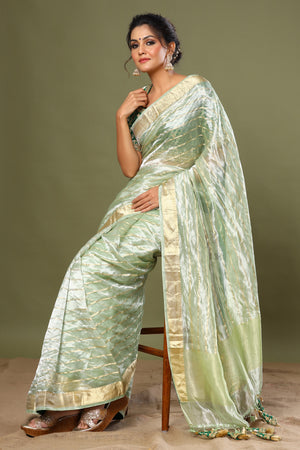 Buy green striped tissue silk sari online in USA with saree blouse. Make a fashion statement at weddings with stunning designer sarees, embroidered sarees with blouse, wedding sarees, handloom sarees from Pure Elegance Indian fashion store in USA.-side