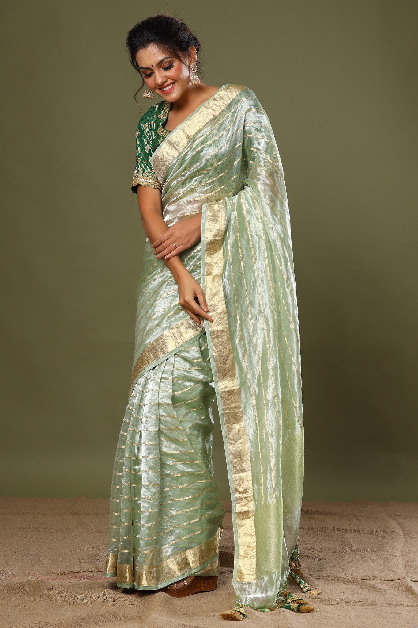 Buy green striped tissue silk sari online in USA with saree blouse. Make a fashion statement at weddings with stunning designer sarees, embroidered sarees with blouse, wedding sarees, handloom sarees from Pure Elegance Indian fashion store in USA.-pallu