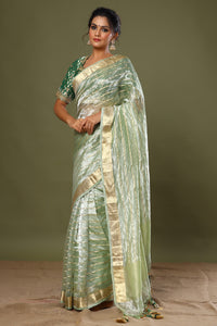 Buy green striped tissue silk sari online in USA with saree blouse. Make a fashion statement at weddings with stunning designer sarees, embroidered sarees with blouse, wedding sarees, handloom sarees from Pure Elegance Indian fashion store in USA.-full view