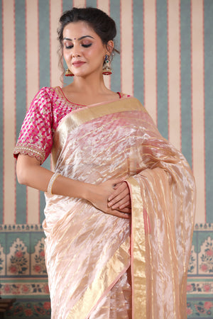 Buy rose gold striped tissue silk sari online in USA with pink saree blouse. Make a fashion statement at weddings with stunning designer sarees, embroidered sarees with blouse, wedding sarees, handloom sarees from Pure Elegance Indian fashion store in USA.-closeup