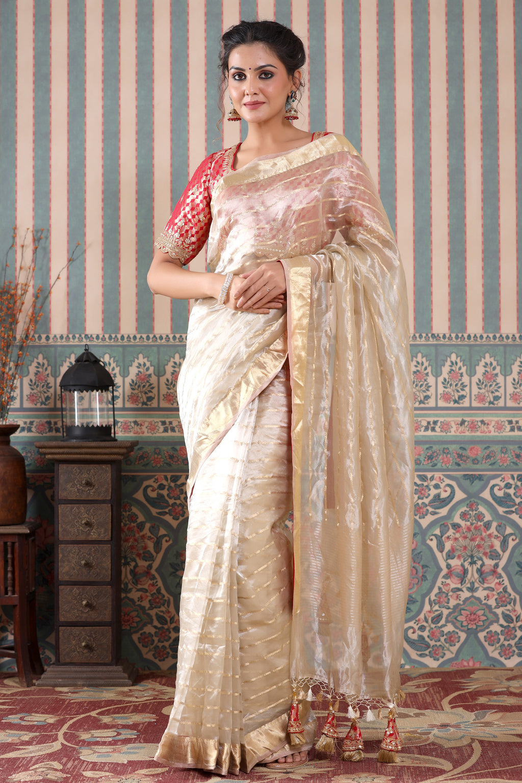 Shop golden striped tissue silk sari online in USA with red saree blouse. Make a fashion statement at weddings with stunning designer sarees, embroidered sarees with blouse, wedding sarees, handloom sarees from Pure Elegance Indian fashion store in USA.-full view