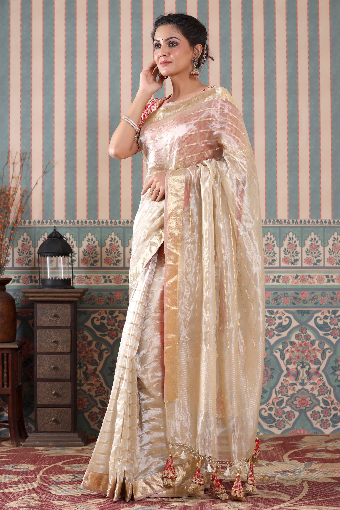 Shop golden striped tissue silk sari online in USA with red saree blouse. Make a fashion statement at weddings with stunning designer sarees, embroidered sarees with blouse, wedding sarees, handloom sarees from Pure Elegance Indian fashion store in USA.-saree