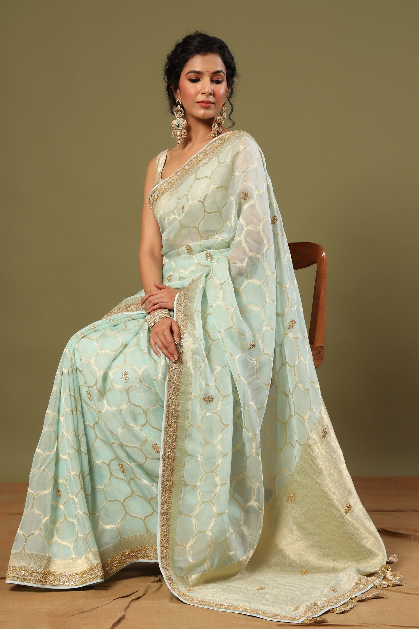 Shop mint green embroidered organza sari online in USA with zari jaal. Make a fashion statement at weddings with stunning designer sarees, embroidered sarees with blouse, wedding sarees, handloom sarees from Pure Elegance Indian fashion store in USA.-pallu