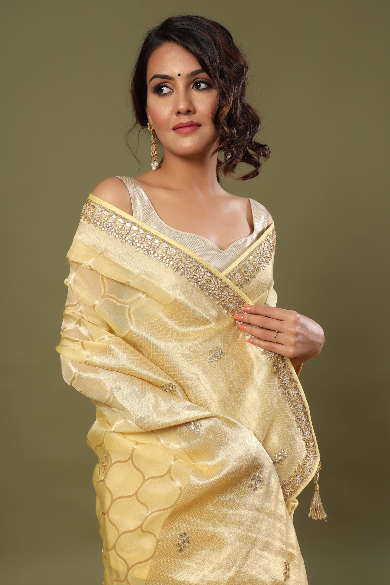 Shop lemon yellow embroidered organza sari online in USA with zari jaal. Make a fashion statement at weddings with stunning designer sarees, embroidered sarees with blouse, wedding sarees, handloom sarees from Pure Elegance Indian fashion store in USA.-closeup