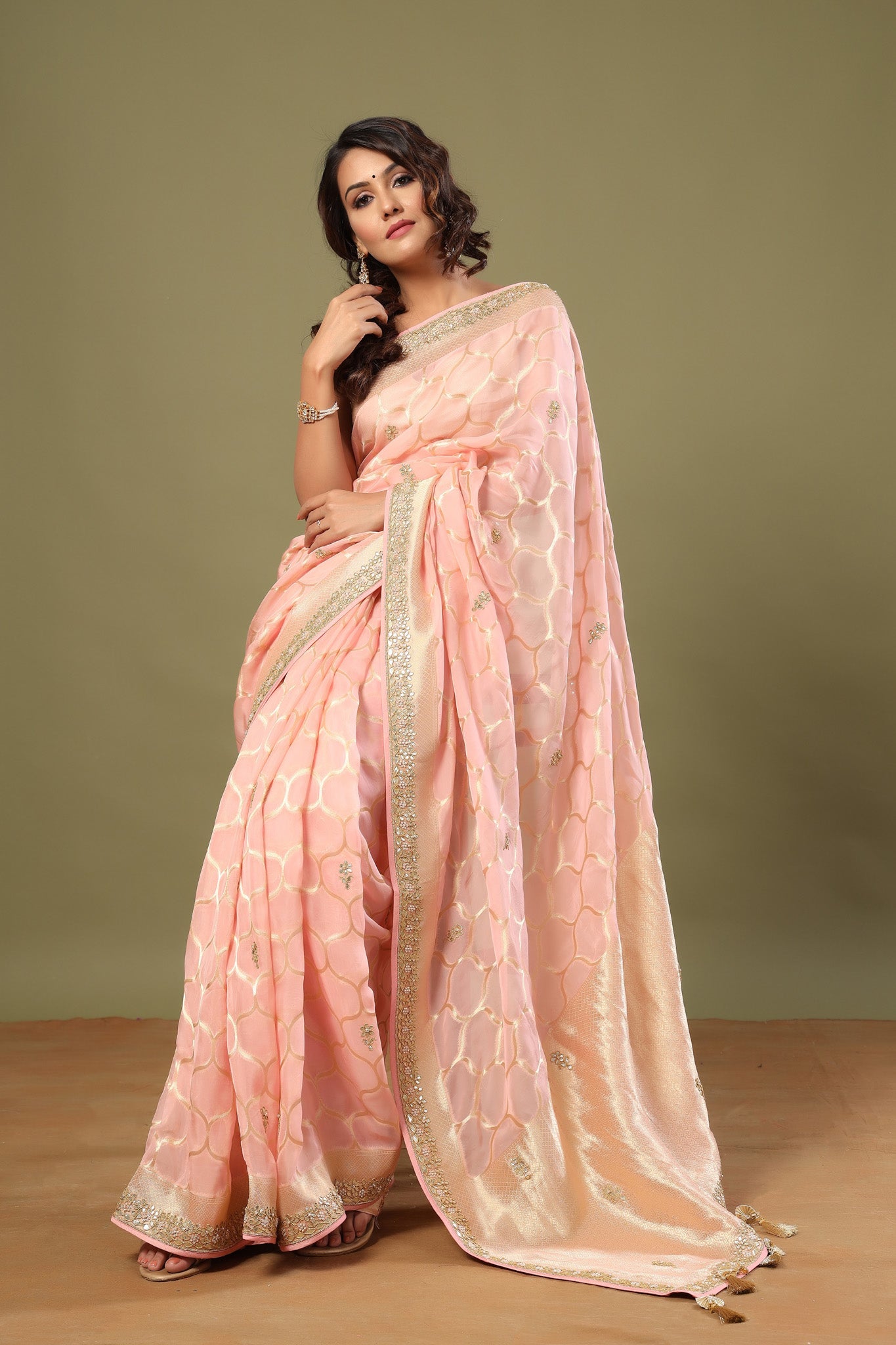 Buy light pink embroidered organza sari online in USA with zari jaal. Make a fashion statement at weddings with stunning designer sarees, embroidered sarees with blouse, wedding sarees, handloom sarees from Pure Elegance Indian fashion store in USA.-front