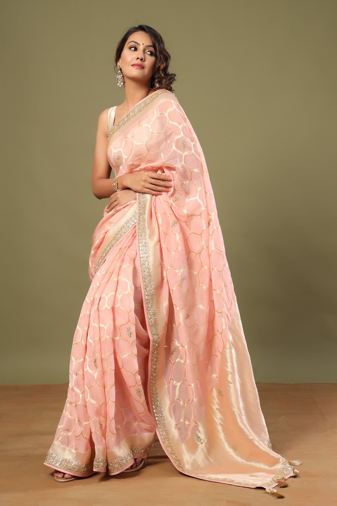 Buy light pink embroidered organza sari online in USA with zari jaal. Make a fashion statement at weddings with stunning designer sarees, embroidered sarees with blouse, wedding sarees, handloom sarees from Pure Elegance Indian fashion store in USA.-pallu