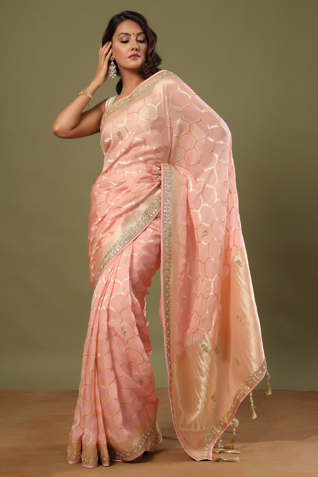 Buy light pink embroidered organza sari online in USA with zari jaal. Make a fashion statement at weddings with stunning designer sarees, embroidered sarees with blouse, wedding sarees, handloom sarees from Pure Elegance Indian fashion store in USA.-full view