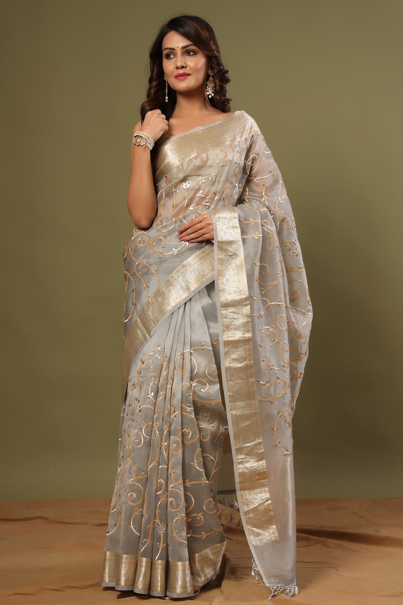 Buy grey gota work organza sari online in USA with zari work. Make a fashion statement at weddings with stunning designer sarees, embroidered sarees with blouse, wedding sarees, handloom sarees from Pure Elegance Indian fashion store in USA.-full view