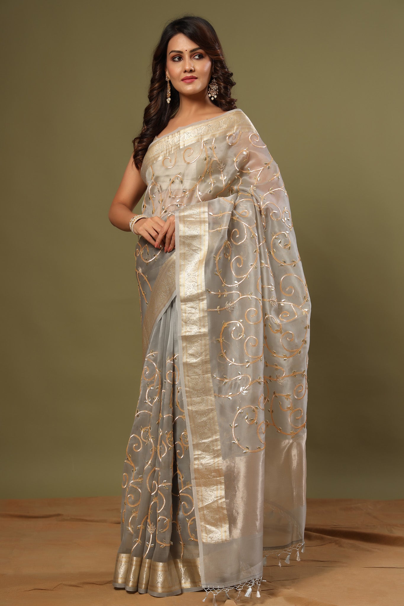 Buy grey gota work organza sari online in USA with zari work. Make a fashion statement at weddings with stunning designer sarees, embroidered sarees with blouse, wedding sarees, handloom sarees from Pure Elegance Indian fashion store in USA.-front